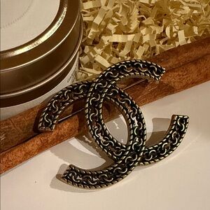 Gold and Black Brooch